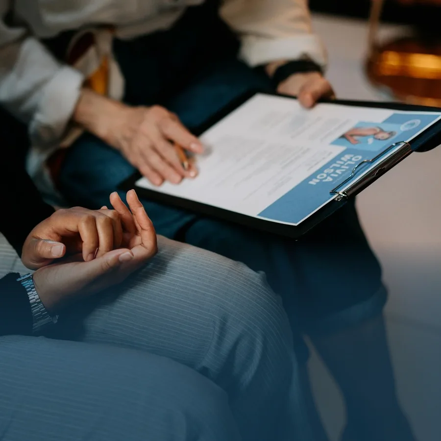 Two employees discussing an applicant for an open job.